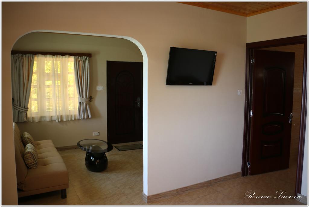 Exotic Guest House Anse Volbert Village Quarto foto
